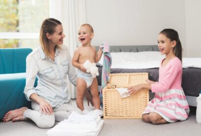 mother-with-two-children-has-fun-together_85574-10399