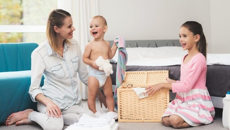 mother-with-two-children-has-fun-together_85574-10399